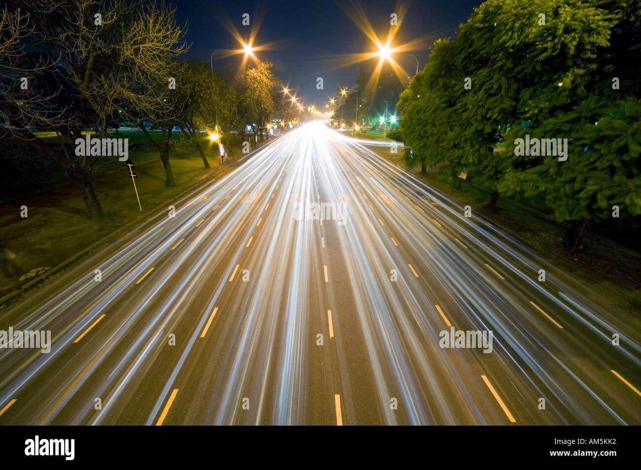 Buenos Aires - Avenida Figueroa Alcorta at night. Six lane urban roadway with long light trails. Slow shutter speed shutterspeed Stock Photo