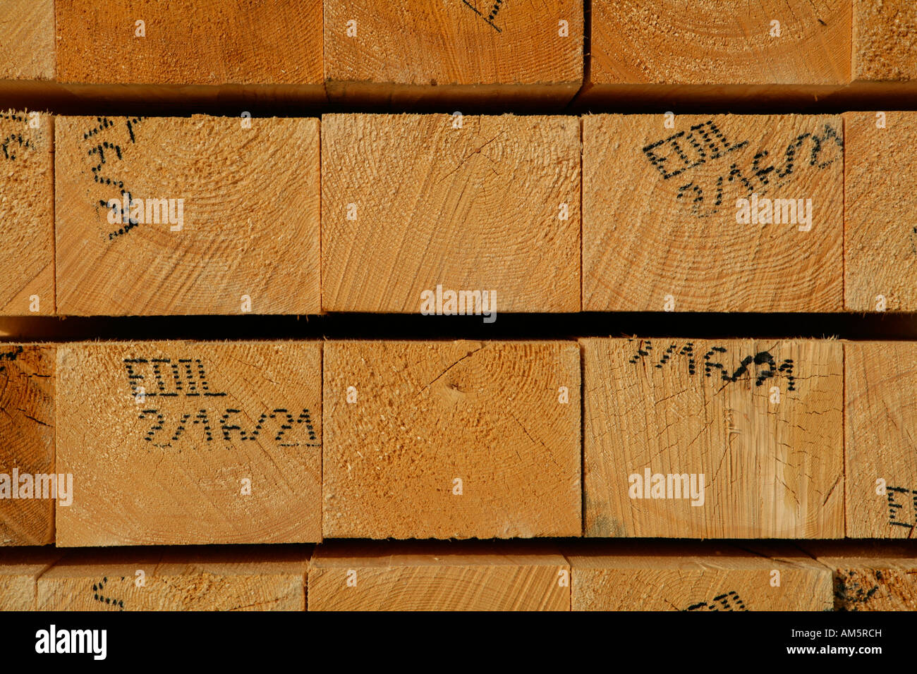 Stacked wooden beams on a lumberyard Stock Photo