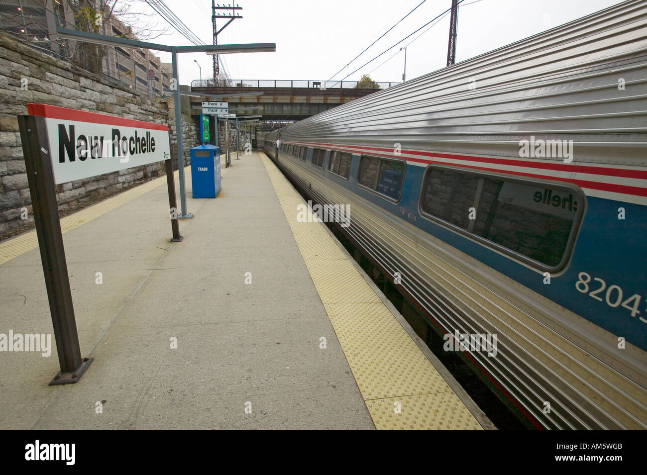 Amtrak train departs from new rochelle new york train station new york