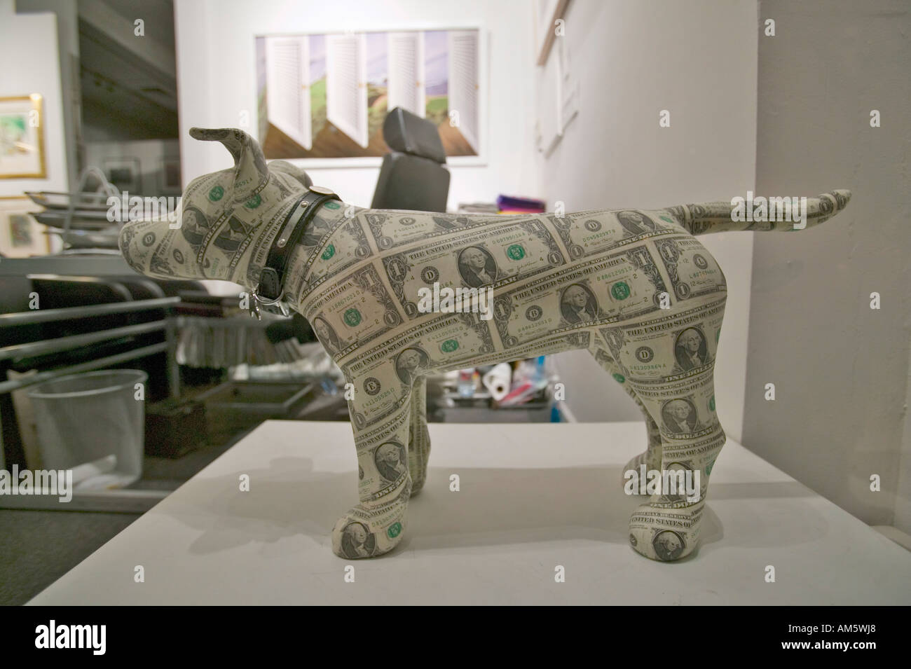 Dog made of money in window of store in New York City New York Stock Photo