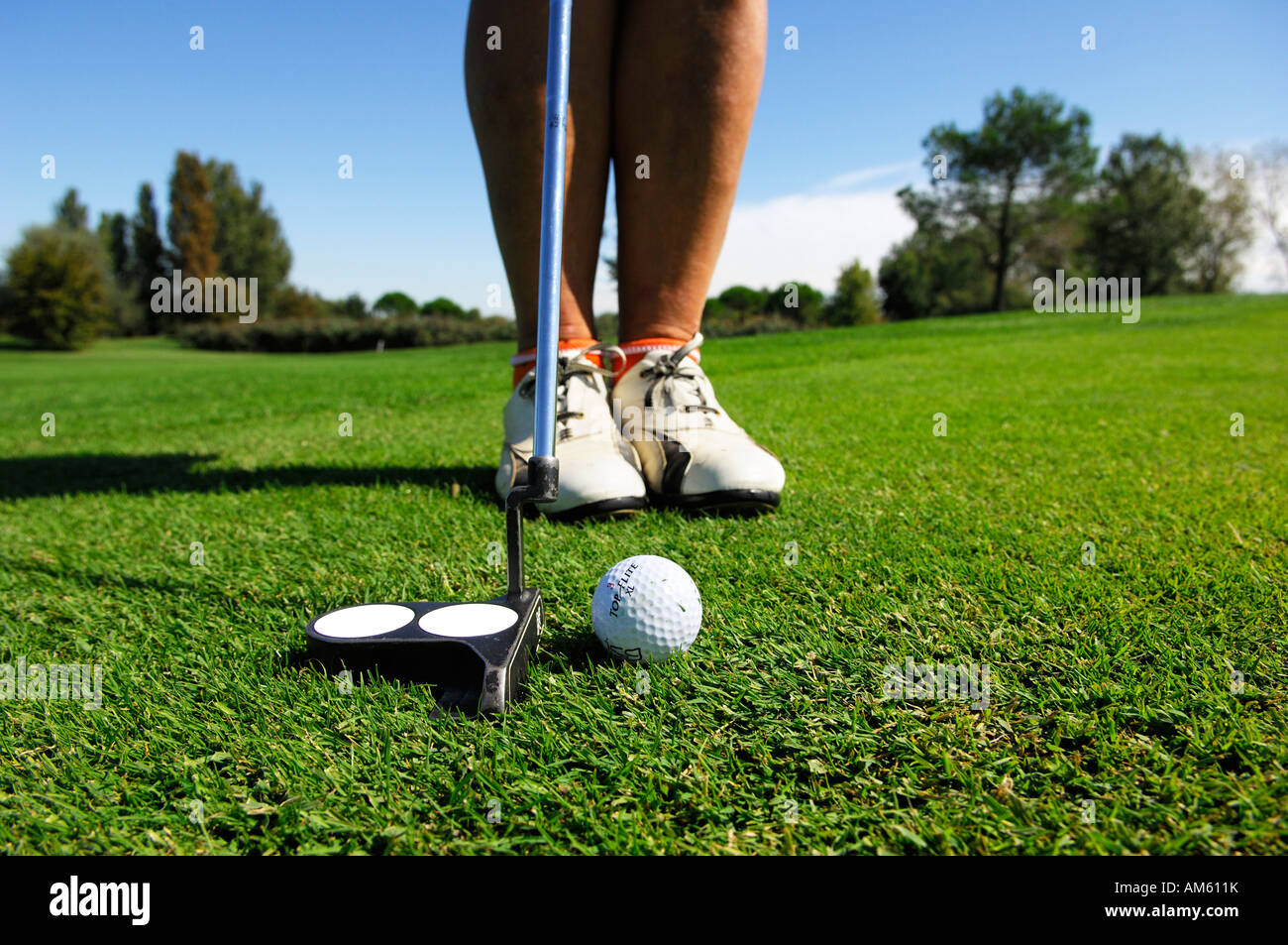 Golfer puting the ball, golf course, Caorle, Veneto, Italy Stock Photo