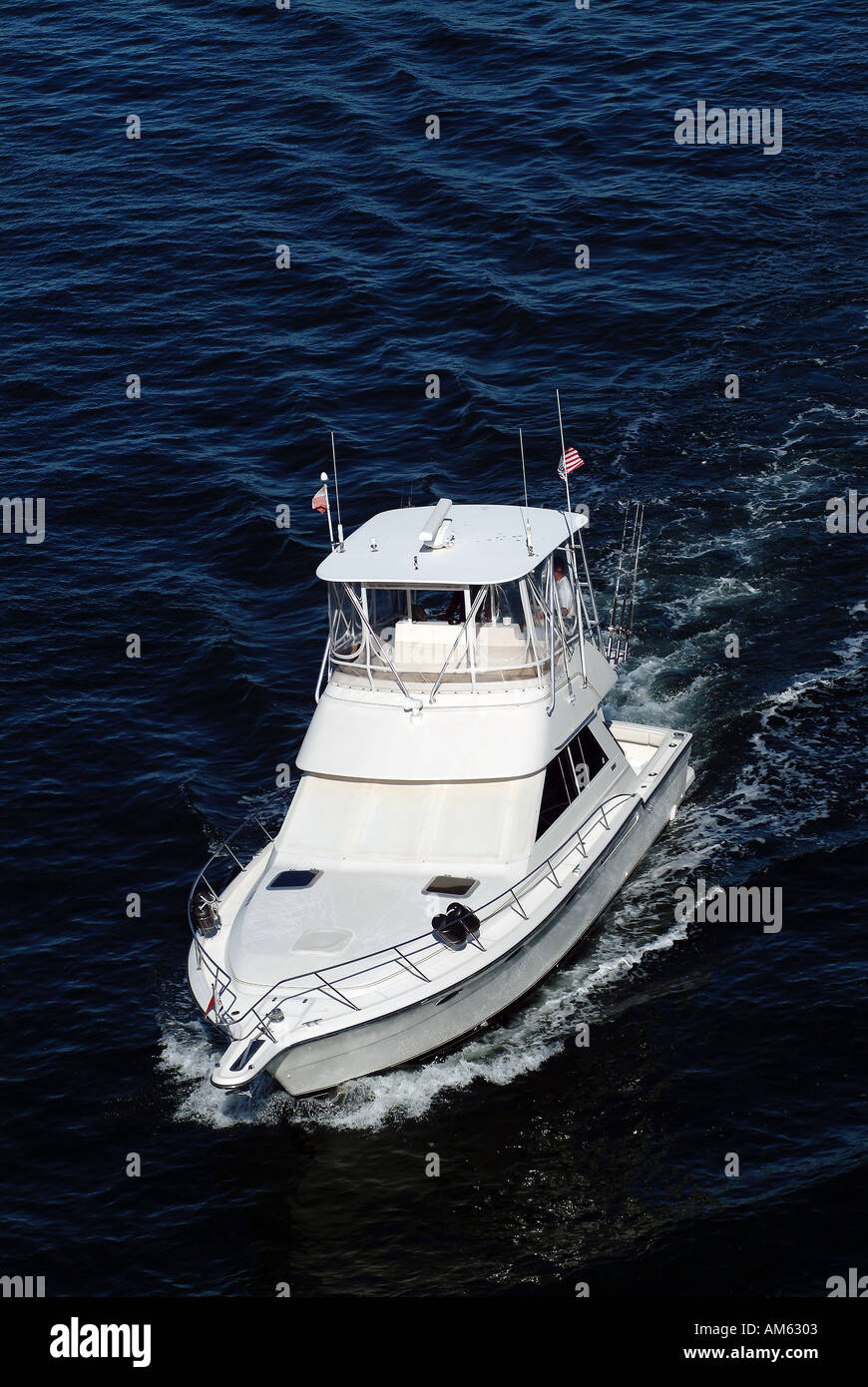 White motorized boat back to the harbour of West Palm Beach Stock Photo