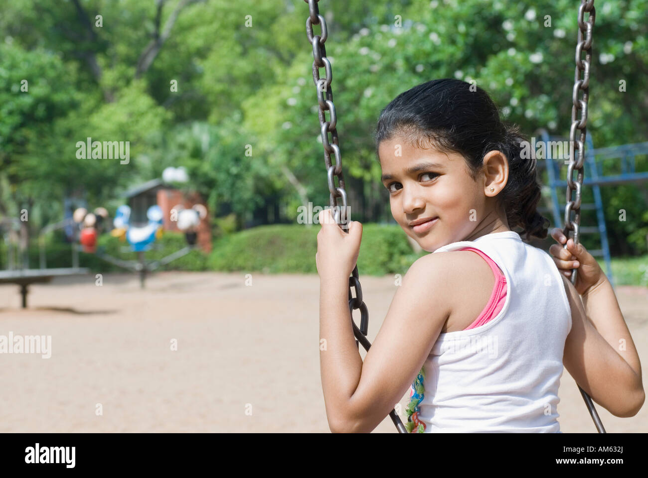 Indian girl sitting on swing hi-res stock photography and images - Alamy