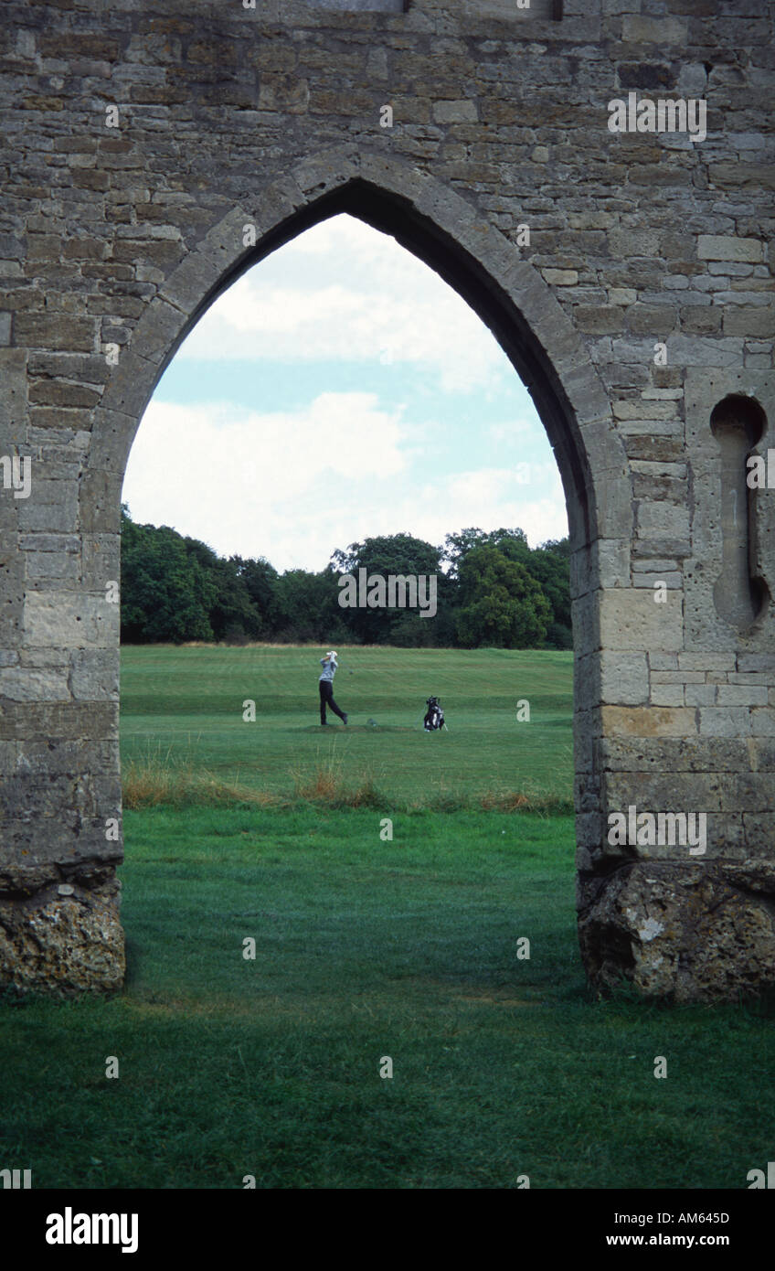 Looking through the arch of Sham Castle with a golfer on the Bath