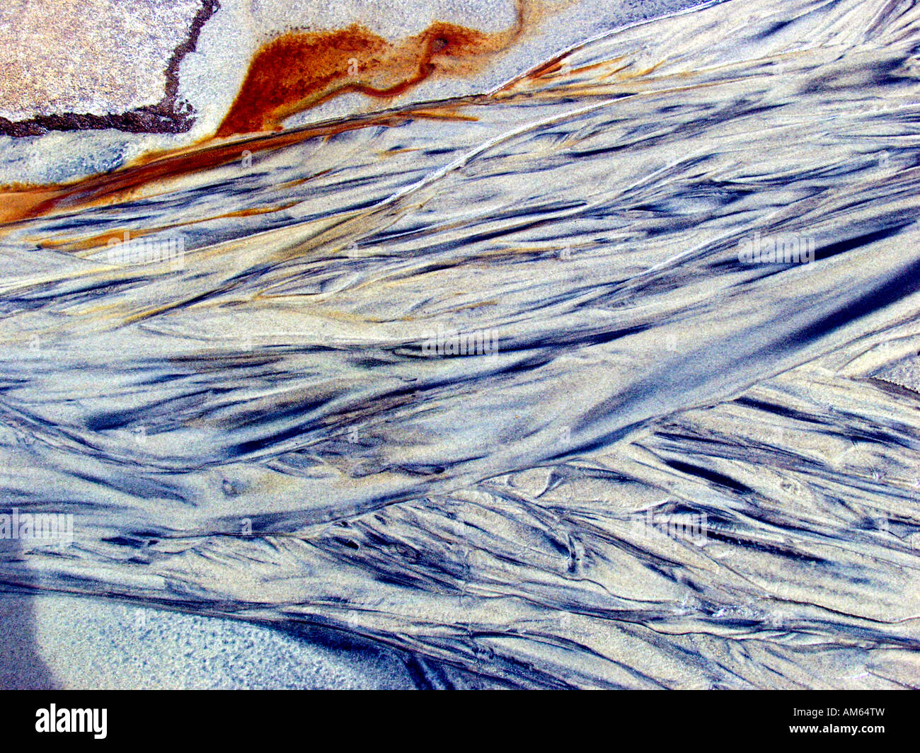 abstract design pattern abstract sand oil minerals iron materials rainbow color colour photograph close up macro landscape moons Stock Photo