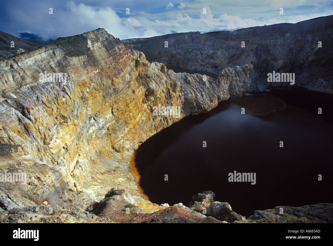 Indonesia Flores The Volcanic caldera of Kelimutu and its ever changing  multi coloured lakes caused by mineral deposits Stock Photo - Alamy