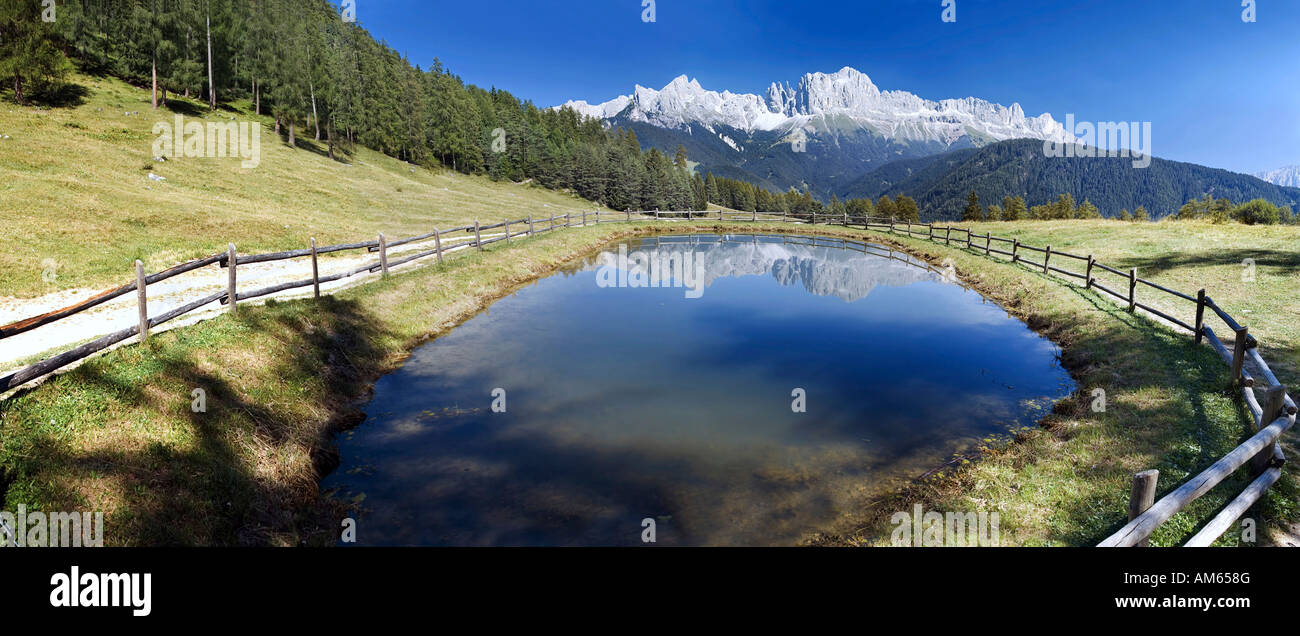 Reflection of the Catinaccio (Rosengarten) massif near Tiers, South Tyrol, Italy Stock Photo