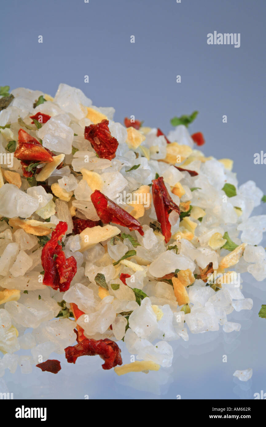 Colourful sea salt, mixture with chili, paprika, oregano, basil, garlic, onions and pepper Stock Photo
