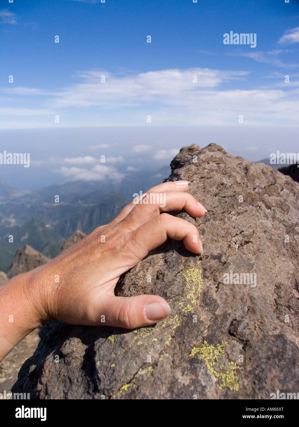 Hand of a freeclimber Stock Photo
