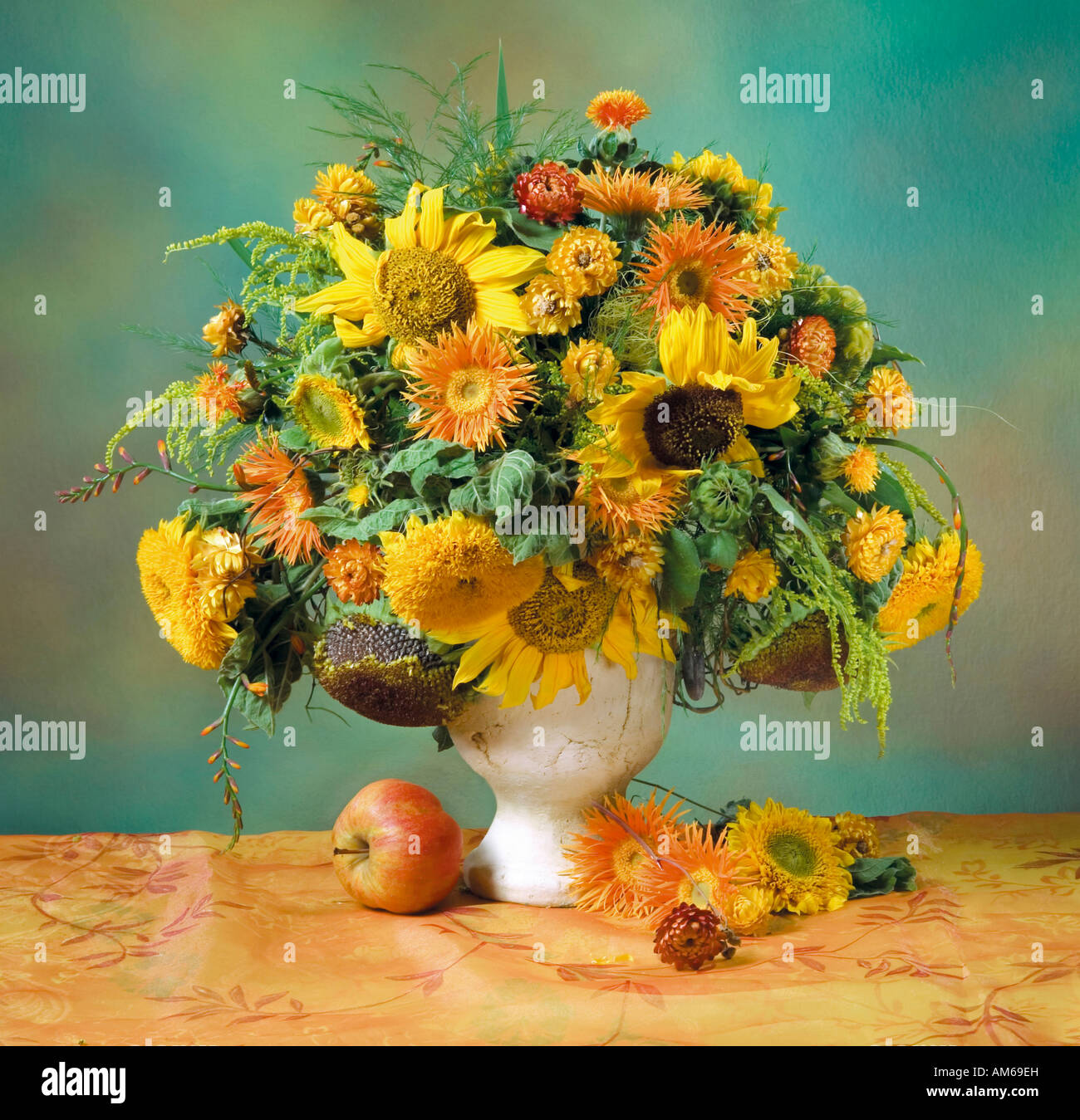 Studio arranged colorful bunch bouquet of yellow sunflowers in a vase ...