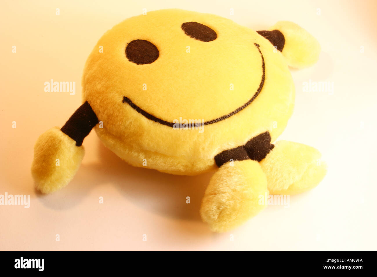 Smiley face soft toy sale