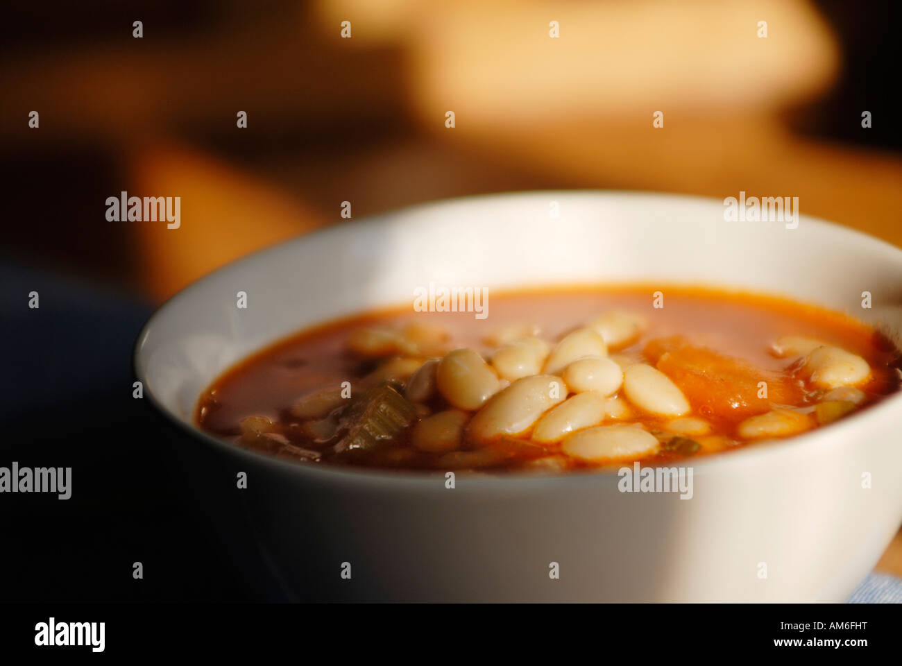 Fasolada traditional Greek white beans soup with celery carrots tomato