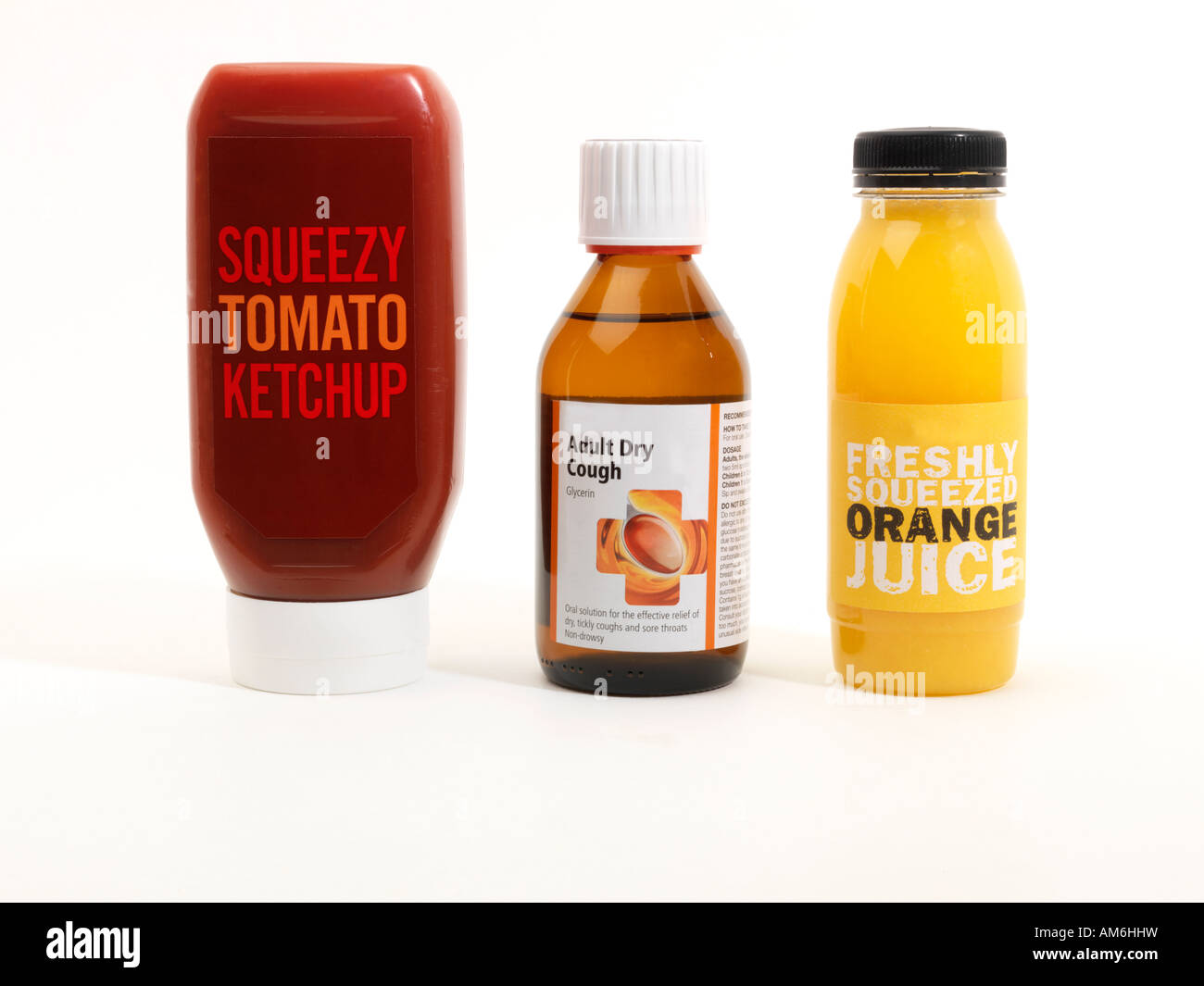 Tomato Ketchup Orange Juice and Cough Medicine Stock Photo Alamy