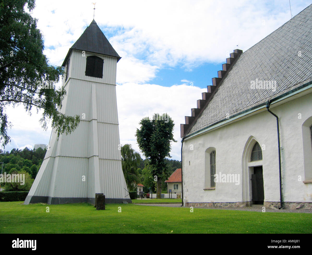 The 14th century church Drothems kyrka with a separate clock tower in idyllic Söderköping Sweden Stock Photo