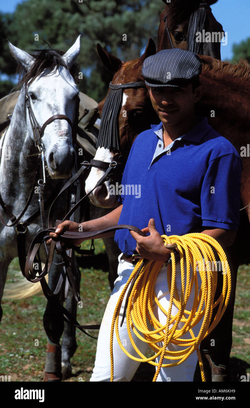 Medina Sidonia a cowboy waiting with fresh horses during the game of Acoso y Deribo Stock Photo