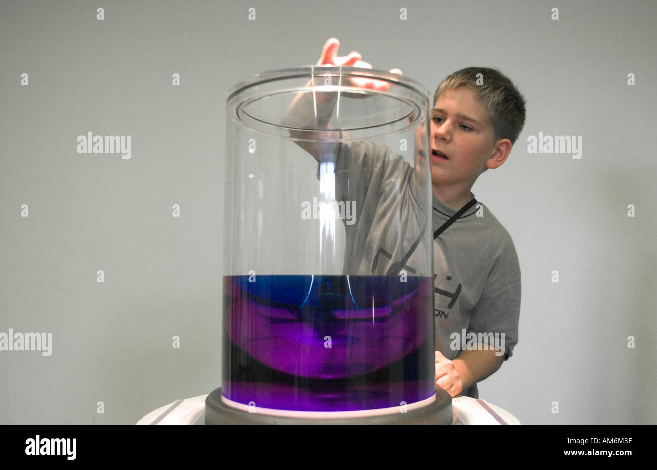 Boy age 12 in the museum for mathematics Mathematicum in Giessen Germany  Stock Photo