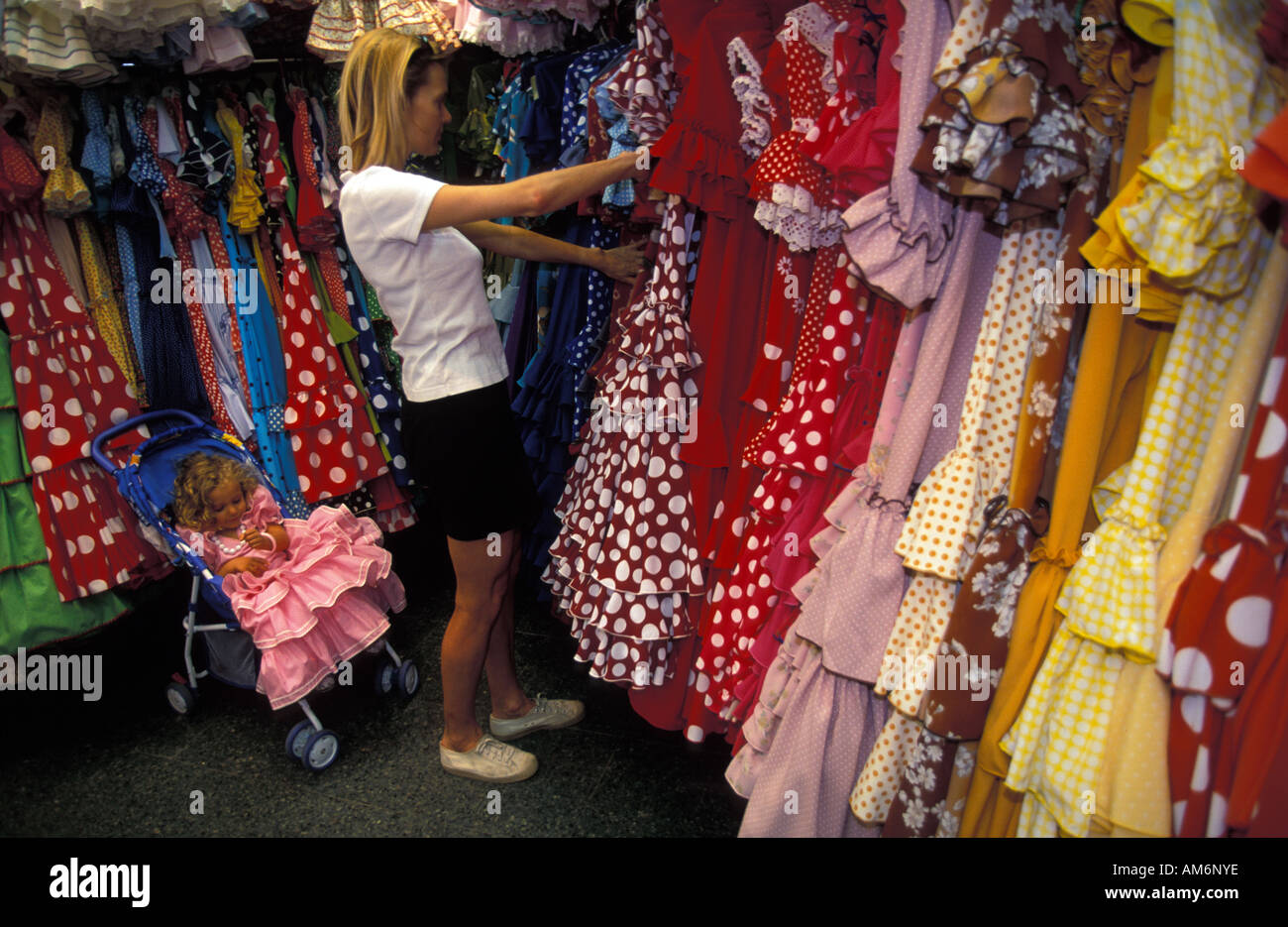A tourist shopping for a flamenco dress 