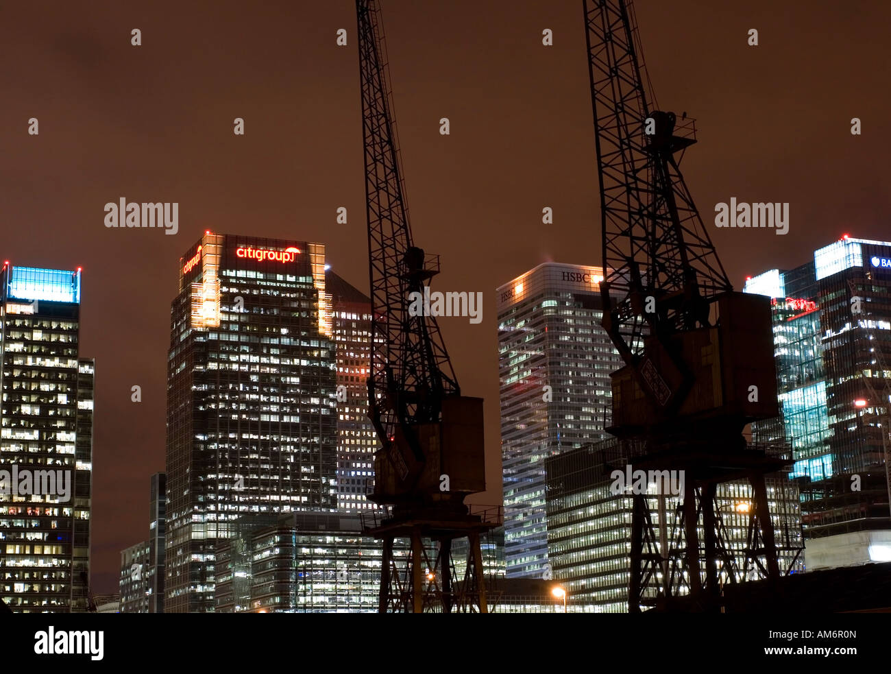 Old cranes Canary Wharf Night London Stock Photo