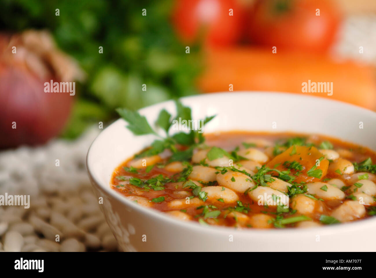 Fasolada traditional Greek white beans soup with celery carrots tomato