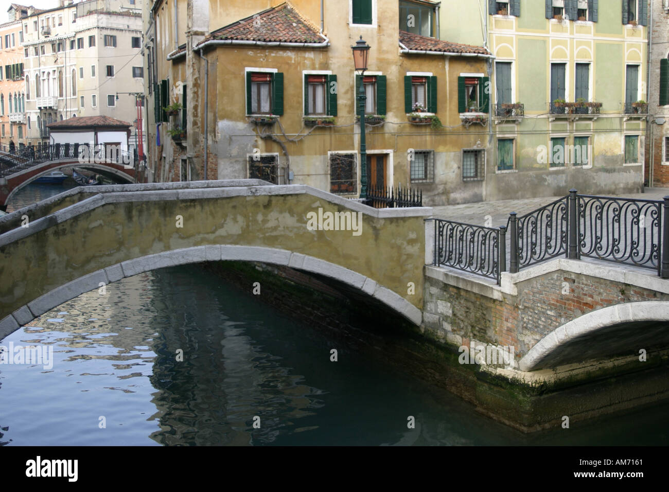 Bridge across calm canal hi-res stock photography and images - Alamy