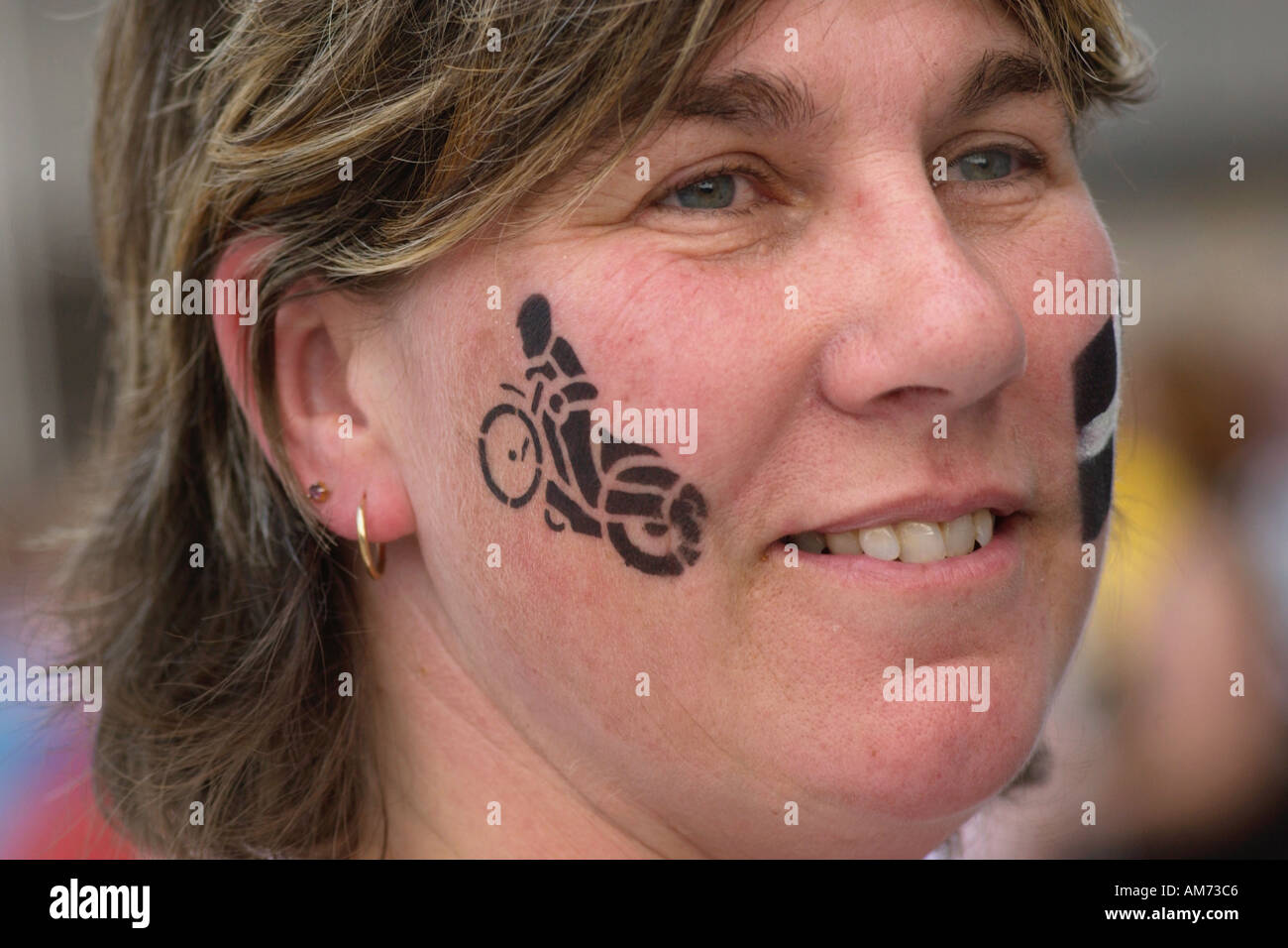 Female speedway fan at the Speedway Grand Prix in Cardiff South Wales UK Stock Photo