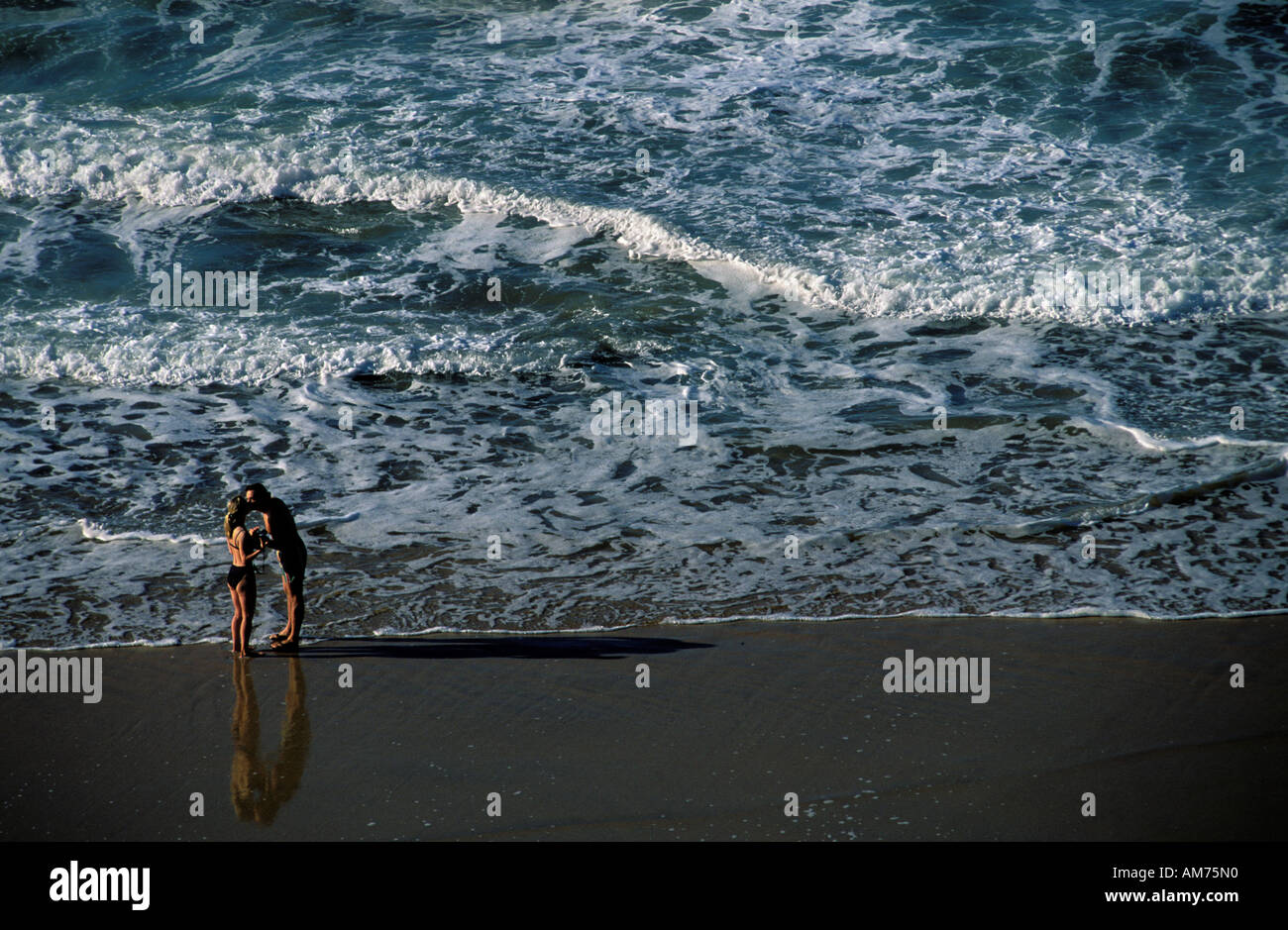 Picture of Romantic couple kissing on the beach Stock Photo - Alamy