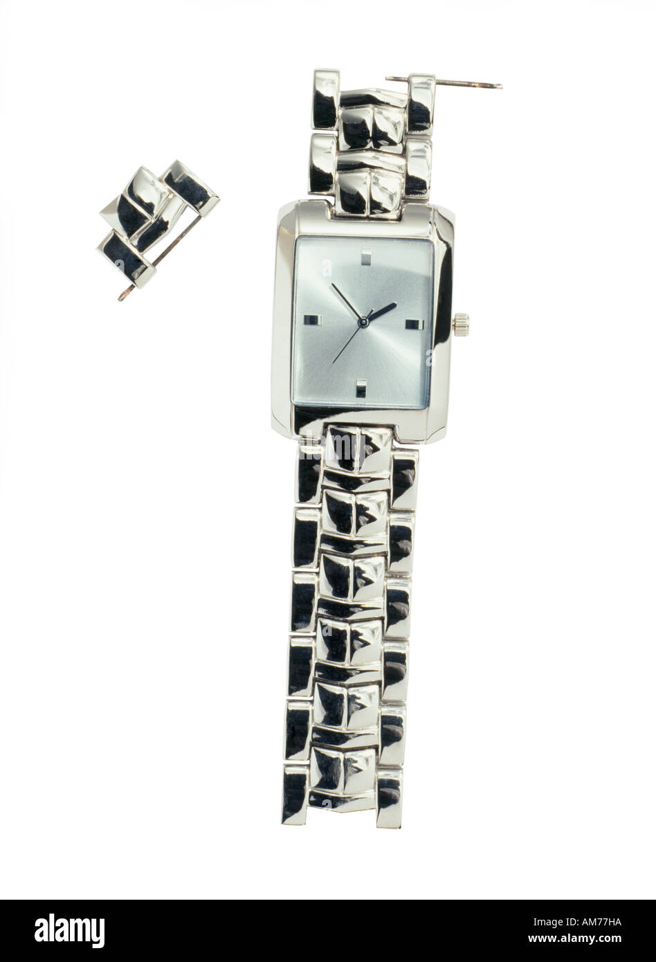 A silver watch and missing link Stock Photo