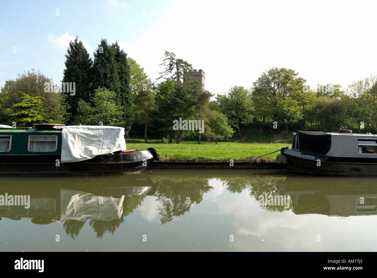 The tower of Great Linford church visible across the Grand Union Canal
