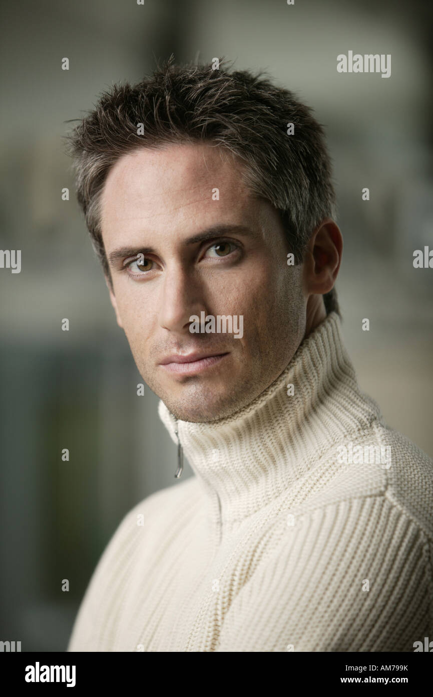 Man in sweater Stock Photo