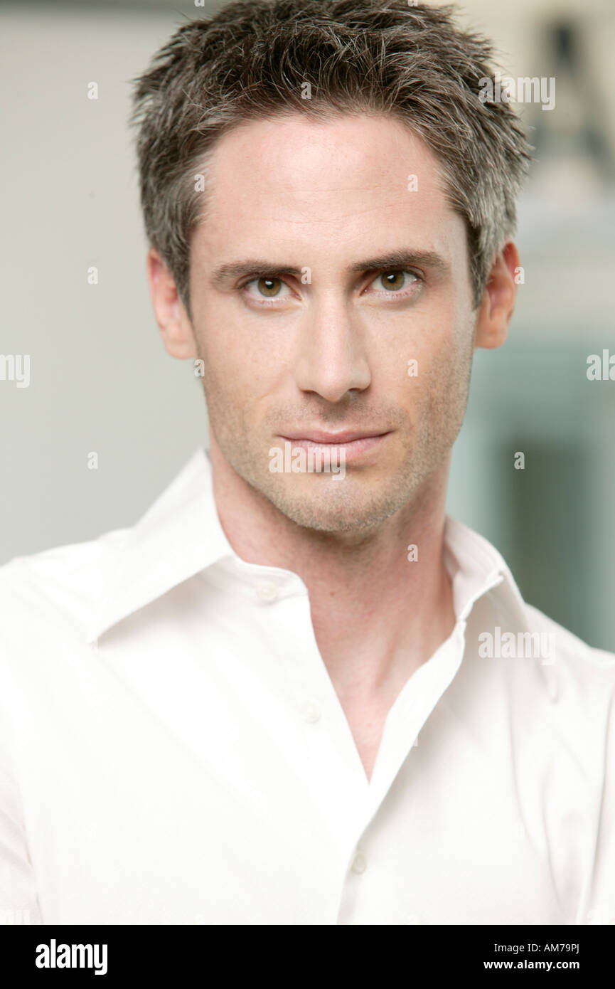 Man in white shirt, close-up Stock Photo