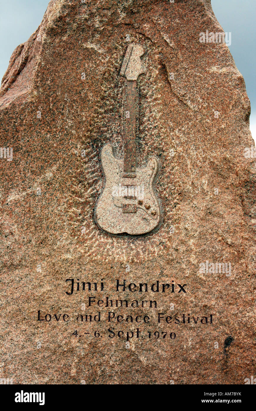 Memorial stone with inscription and relief of an electric guitar at the site of Jimi Hendrix