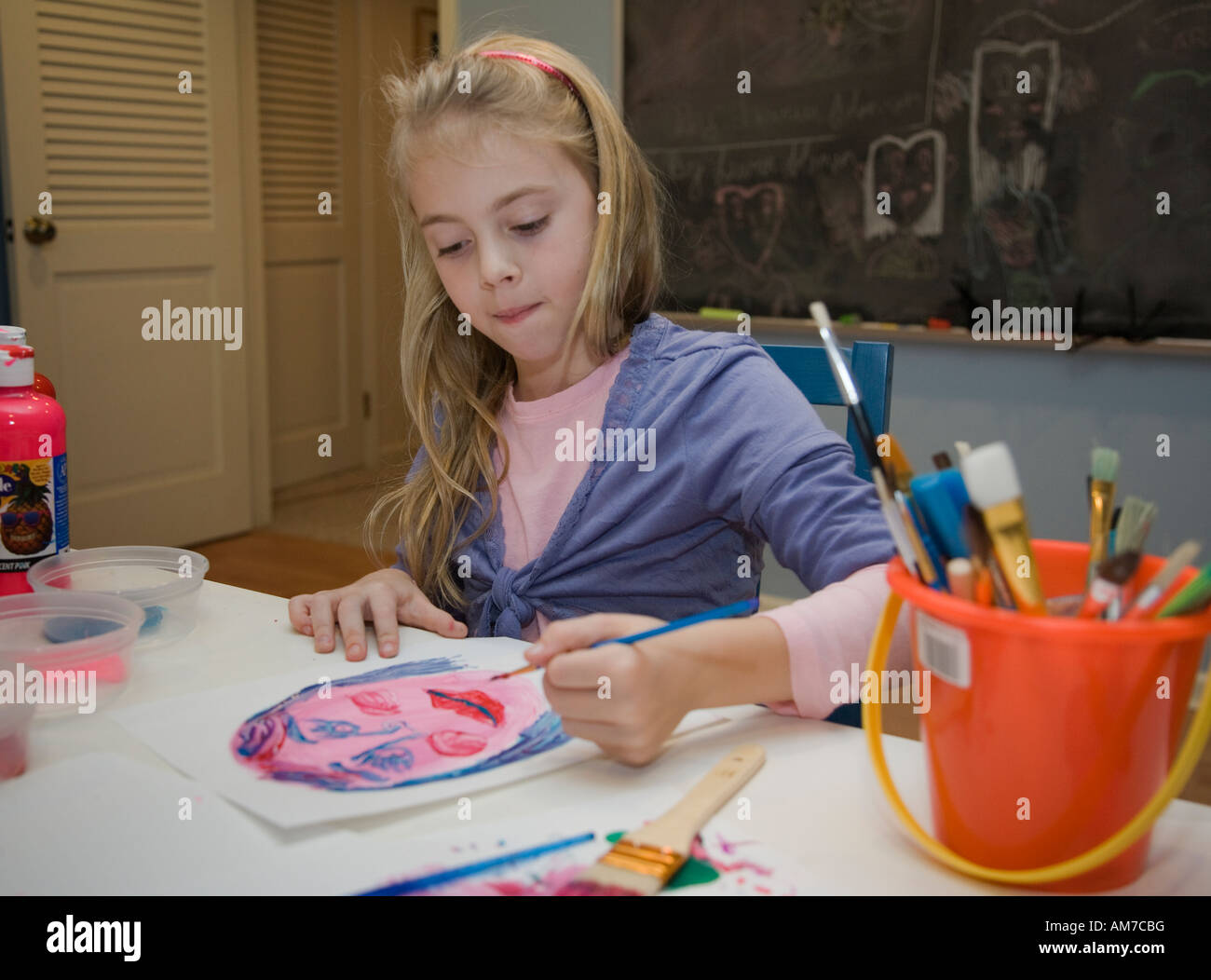 Eight year old girl painting hi-res stock photography and images - Alamy