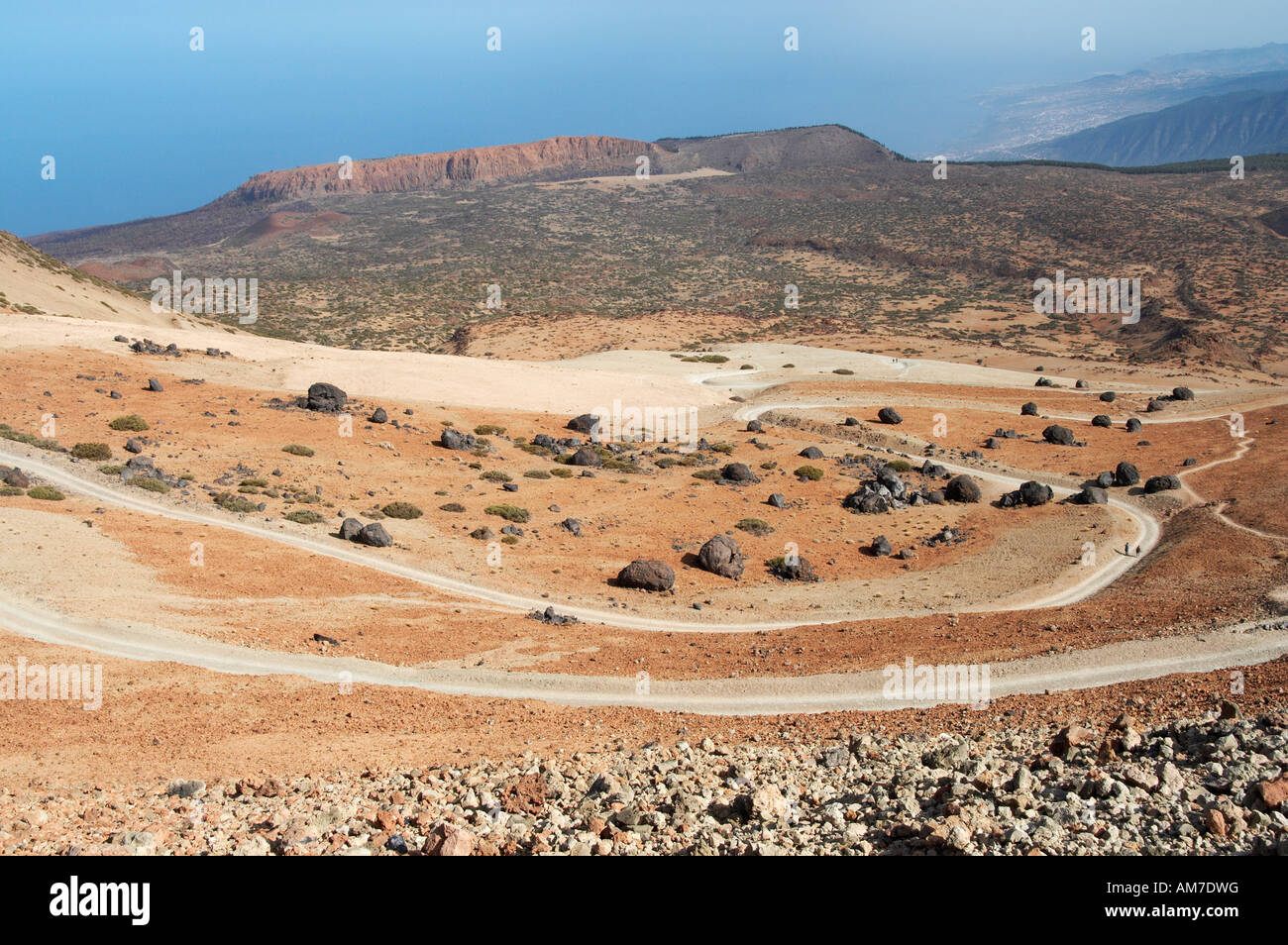 Hikers on the footpath that leads to the summit of mount Teide, Spain's highest mountain, on Tenerife in the Canaries Stock Photo