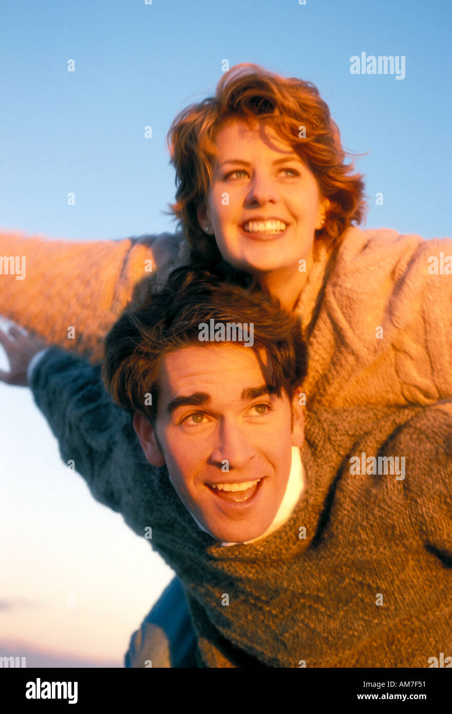 Couple piggyback ride  Stock Photo
