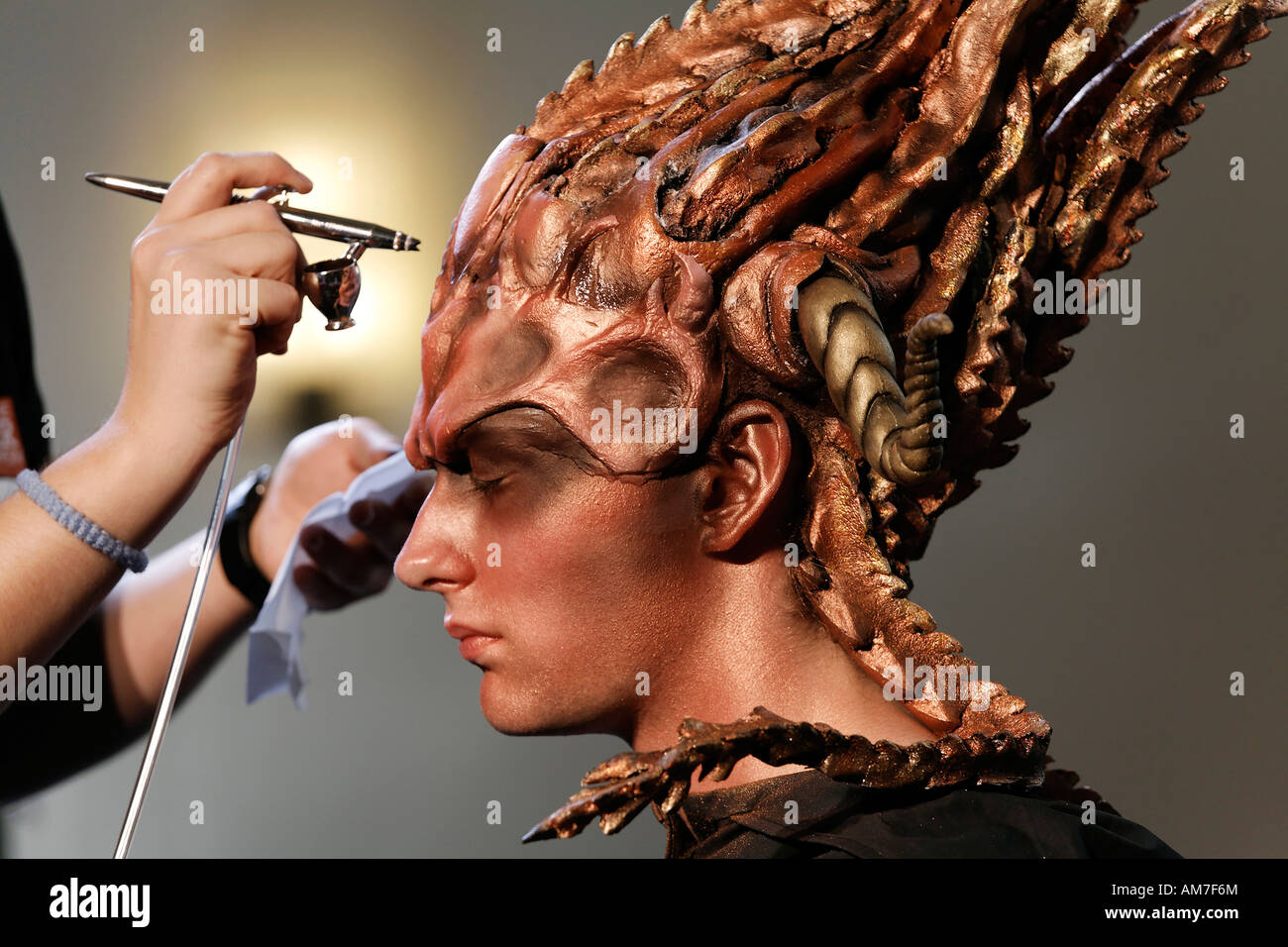 Surrealistic made up young man with mask, bodypainting presentation, German Opera at the Rhine, Duesseldorf, NRW, Germany Stock Photo