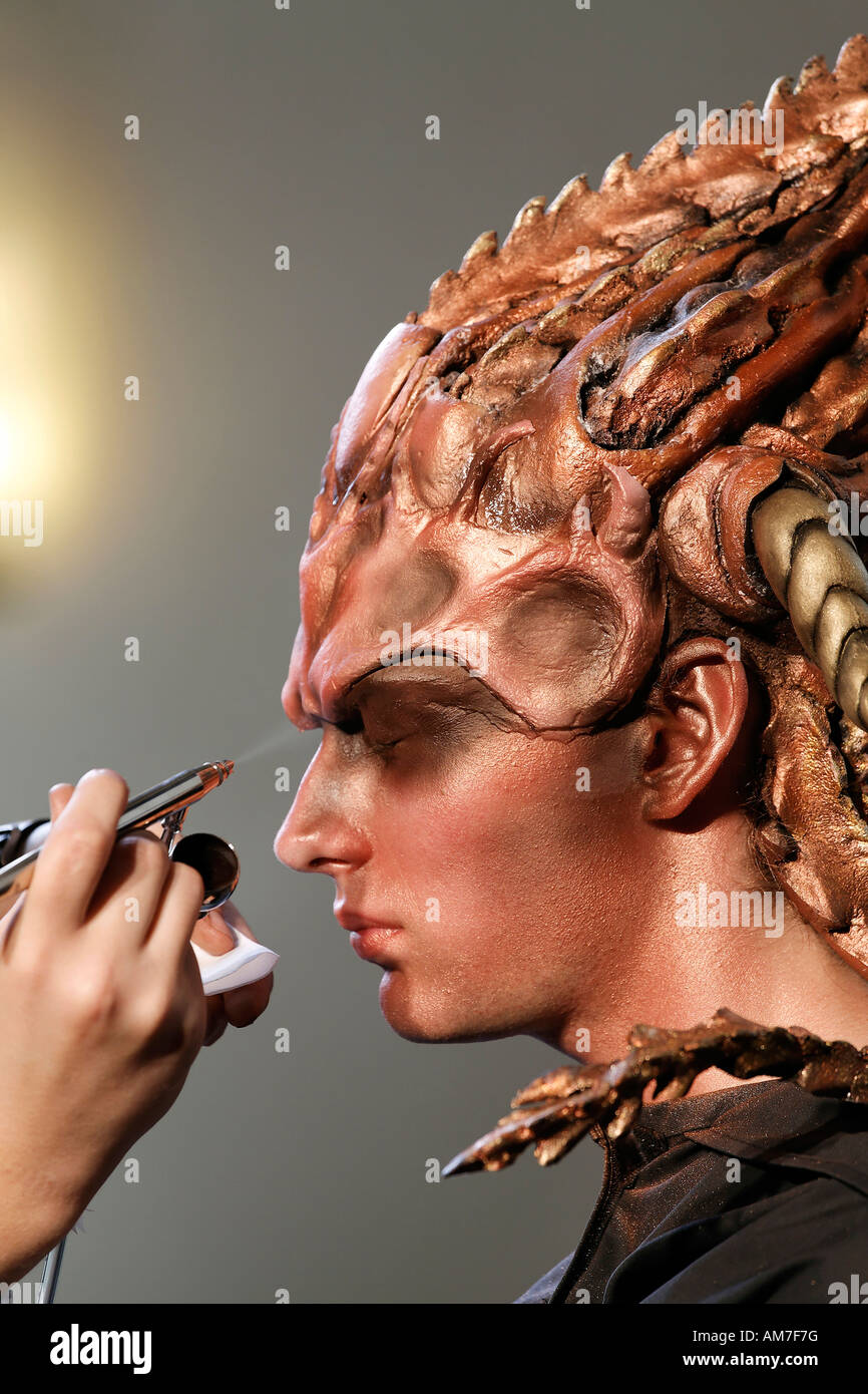 Surrealistic made up young man with mask, bodypainting presentation, German Opera at the Rhine, Duesseldorf, NRW, Germany Stock Photo