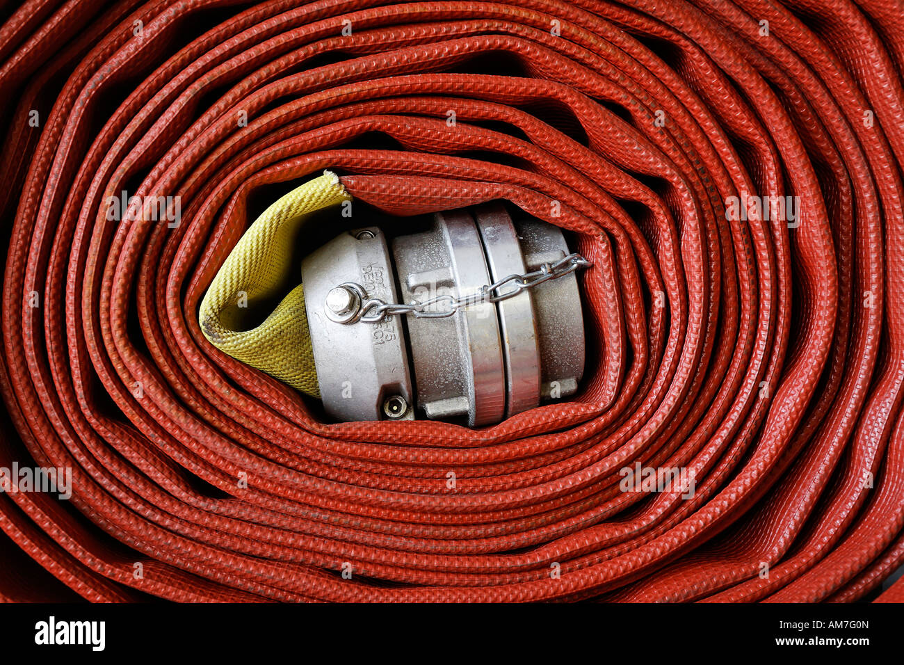 Wind up hose oft the fire brigade, Germany Stock Photo