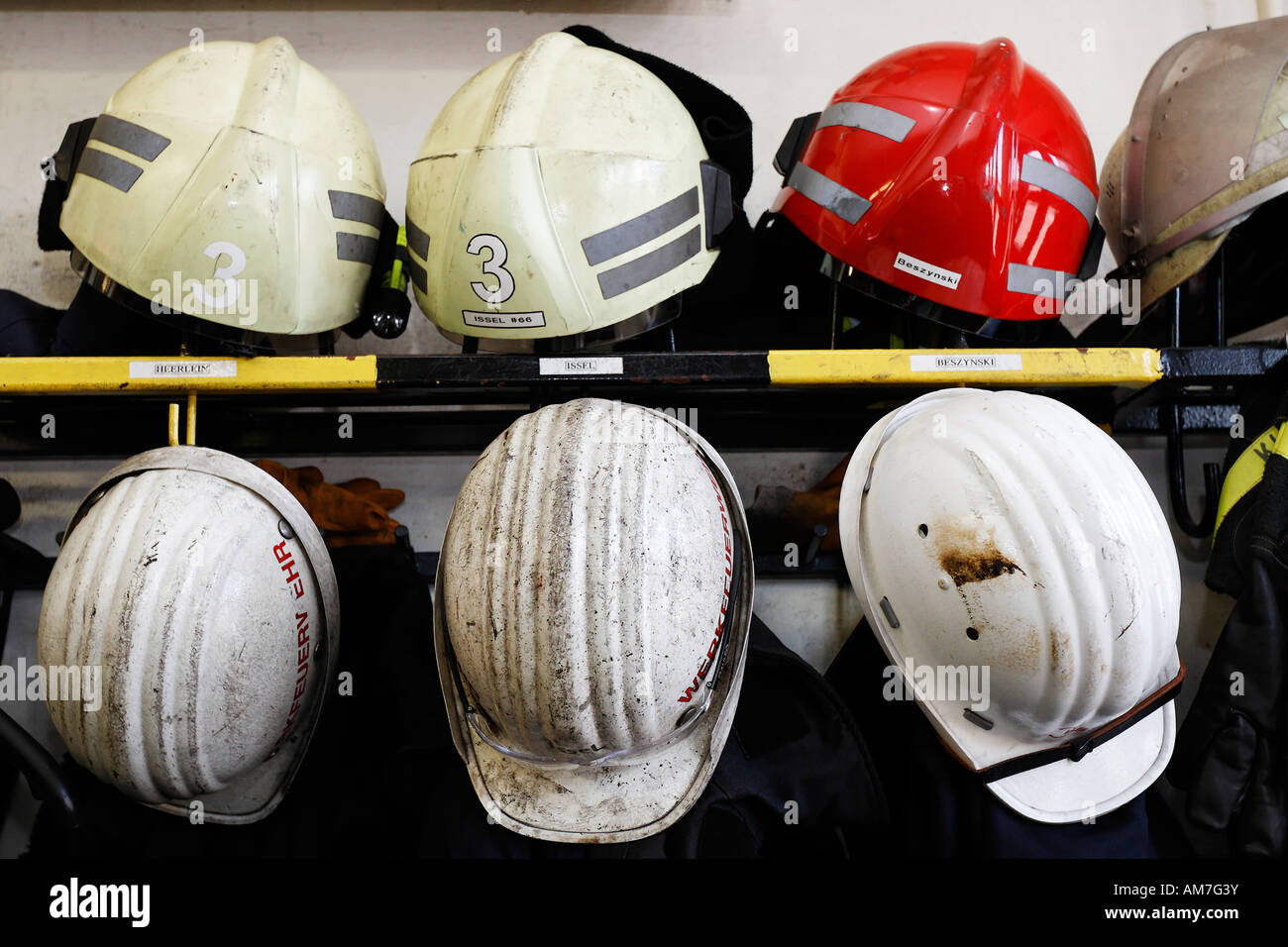 Helmets of fire fighters at the men's quarter, Germany Stock Photo