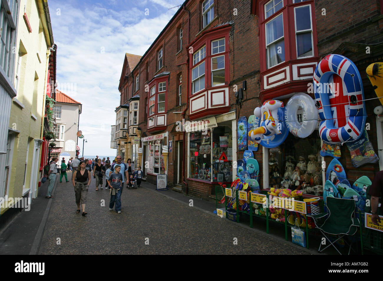 Typical seafront tourist gift souvenir shops in popular North Norfolk coastal holiday resort of