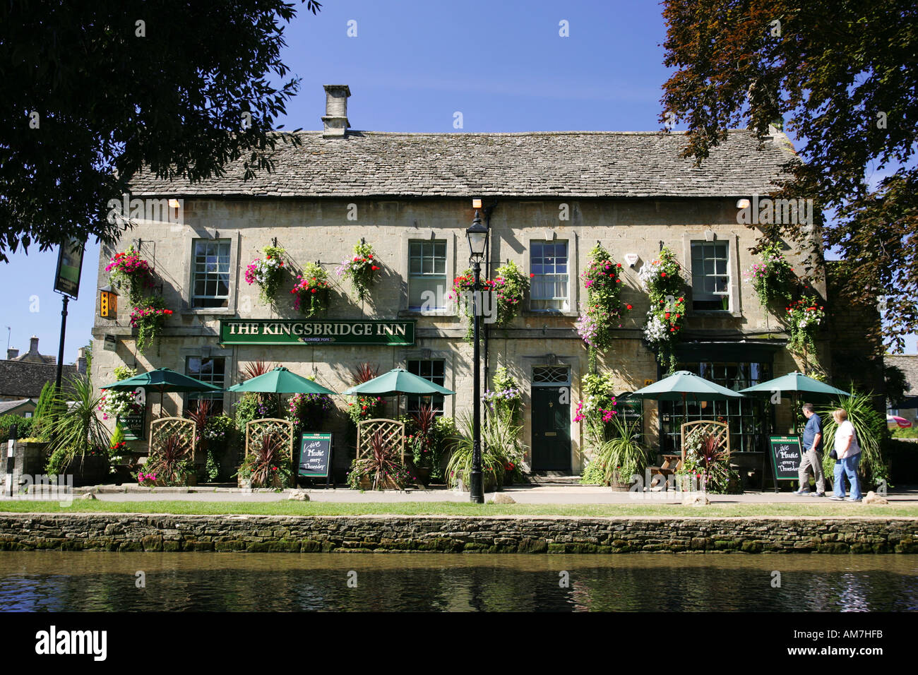 Famous Cotswold pub public house the Kingsbridge Inn viewed across