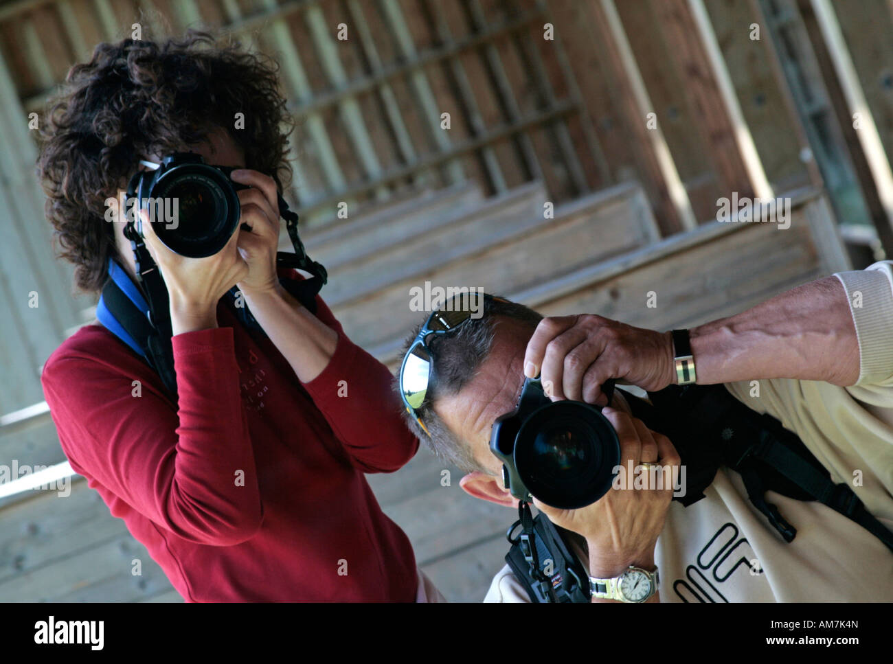 Two photographers doing their job, Berlin, Germany Stock Photo Alamy
