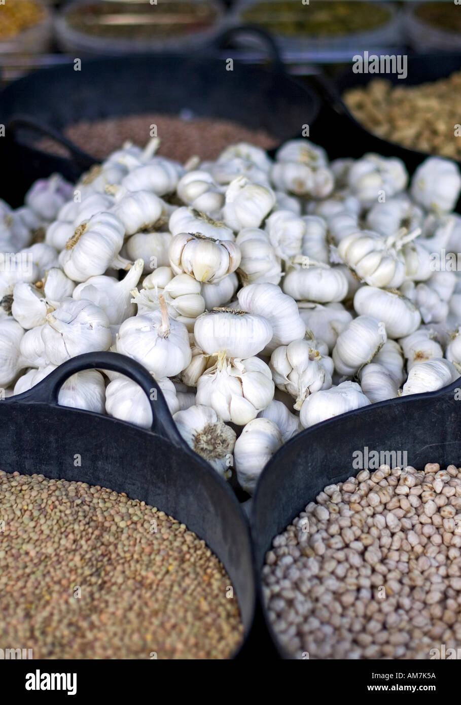 Spices and cloves of garlic on a market stall in Spain Stock Photo Alamy