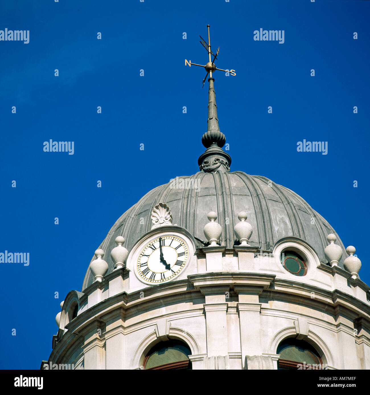 Dome with clock and weather vane London England Stock Photo Alamy