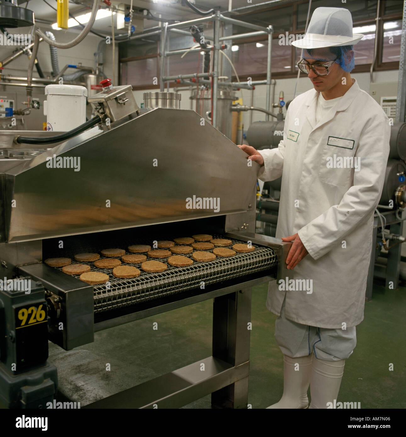 Technician worker in white overalls and headwear with 1990s Cryogenic ...