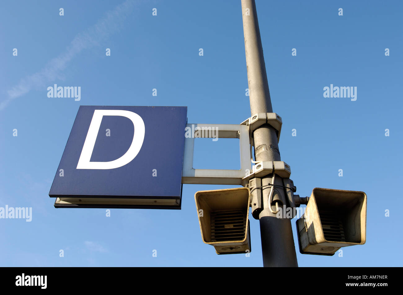 Sign D marking the departure platform section and loudspeakers, Deutsche Bahn, Germany Stock Photo