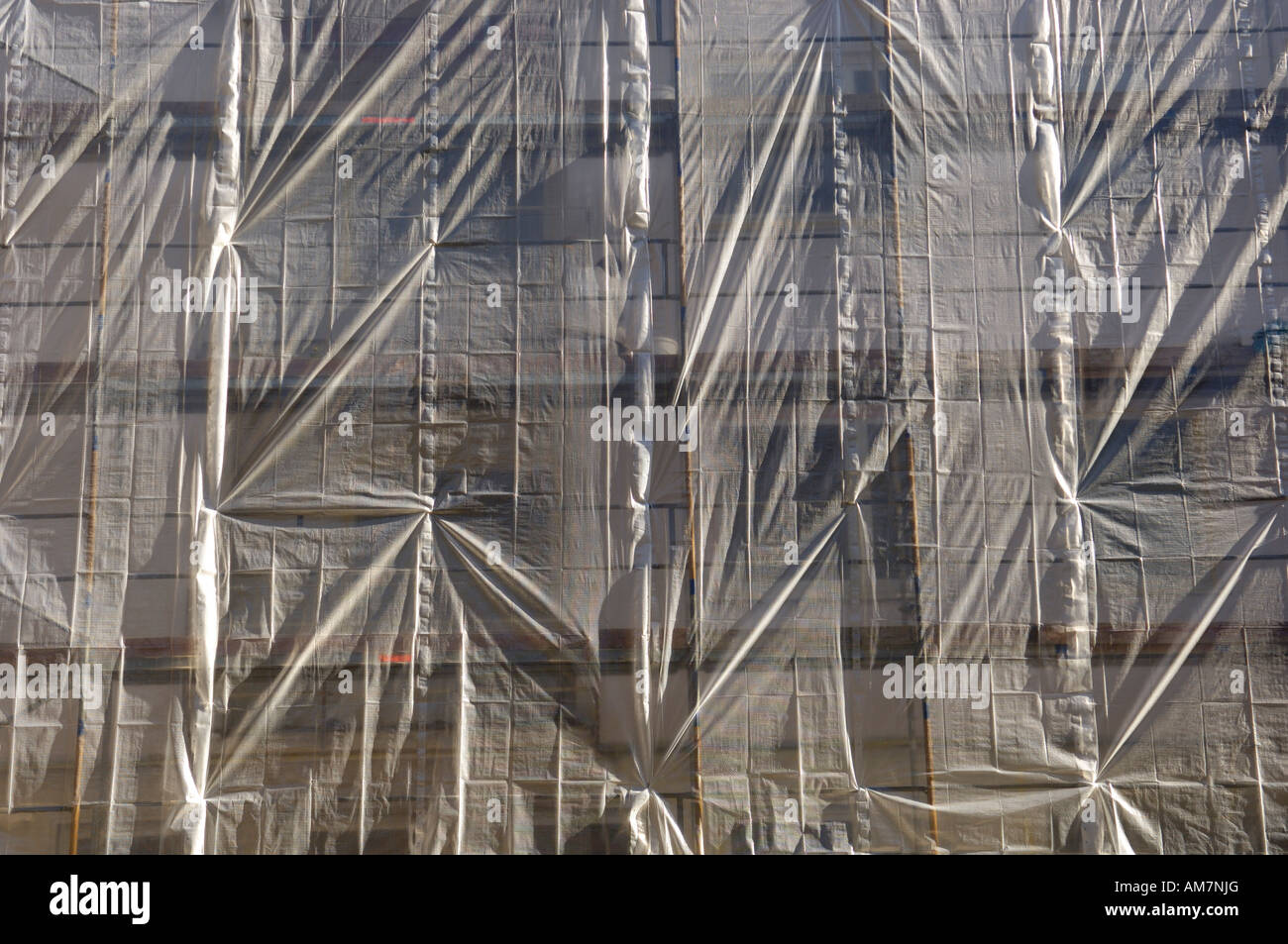 Scaffolding with tarpaulin, encasement Stock Photo