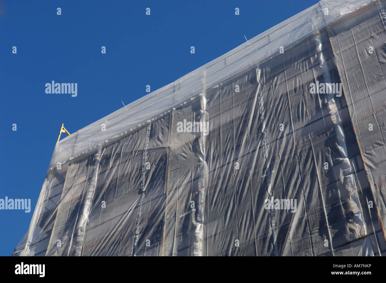 Scaffolding with tarpaulin, encasement Stock Photo
