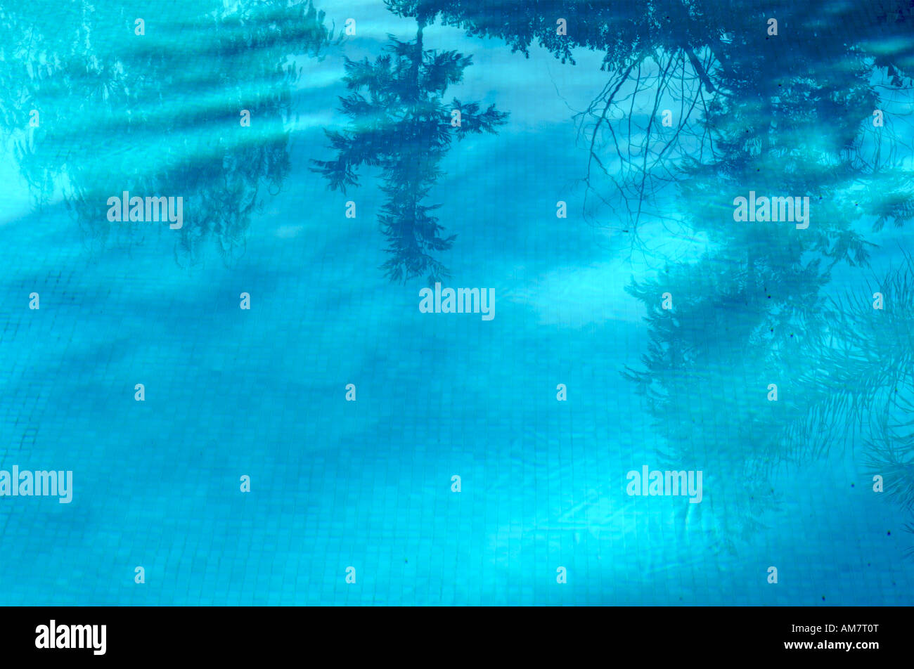 Reflections in an outdoor swimming pool Stock Photo