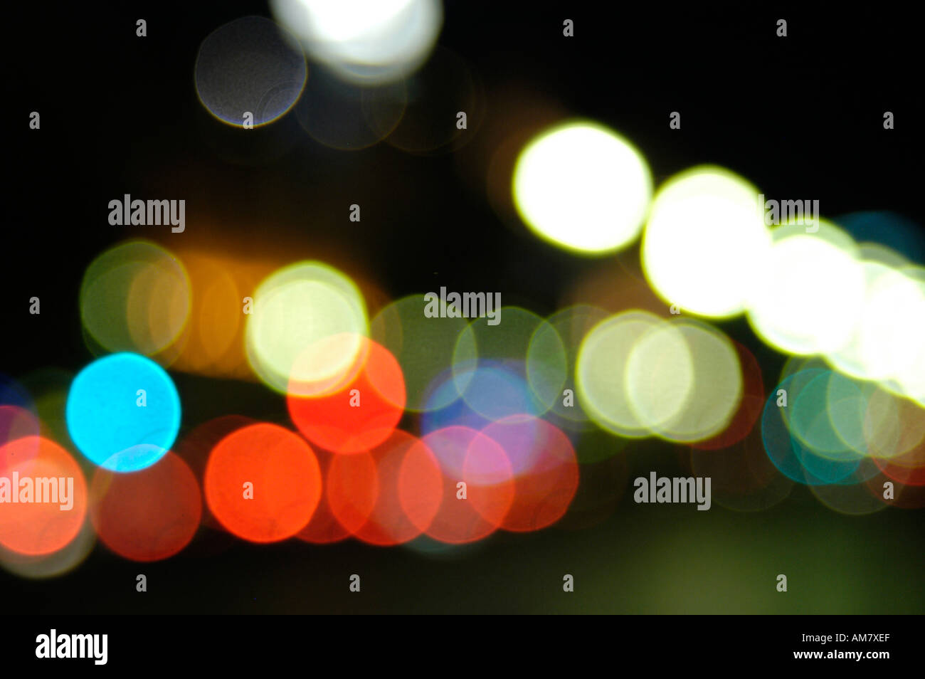 Blurred street lights at night Stock Photo