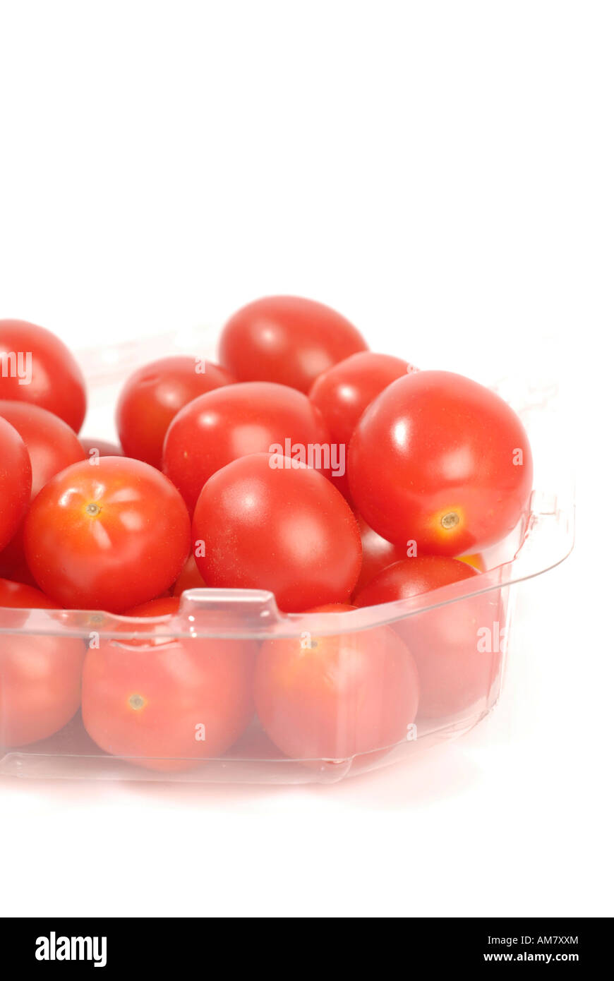 Tomatoes in plastic wrapping Stock Photo